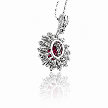 Collana con pendente rubino ovale ct 0,75 e diamanti ct 0,27 in oro bianco 18kt (750)