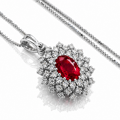 Collana con pendente rubino ovale ct 0,75 e diamanti ct 0,27 in oro bianco 18kt (750)