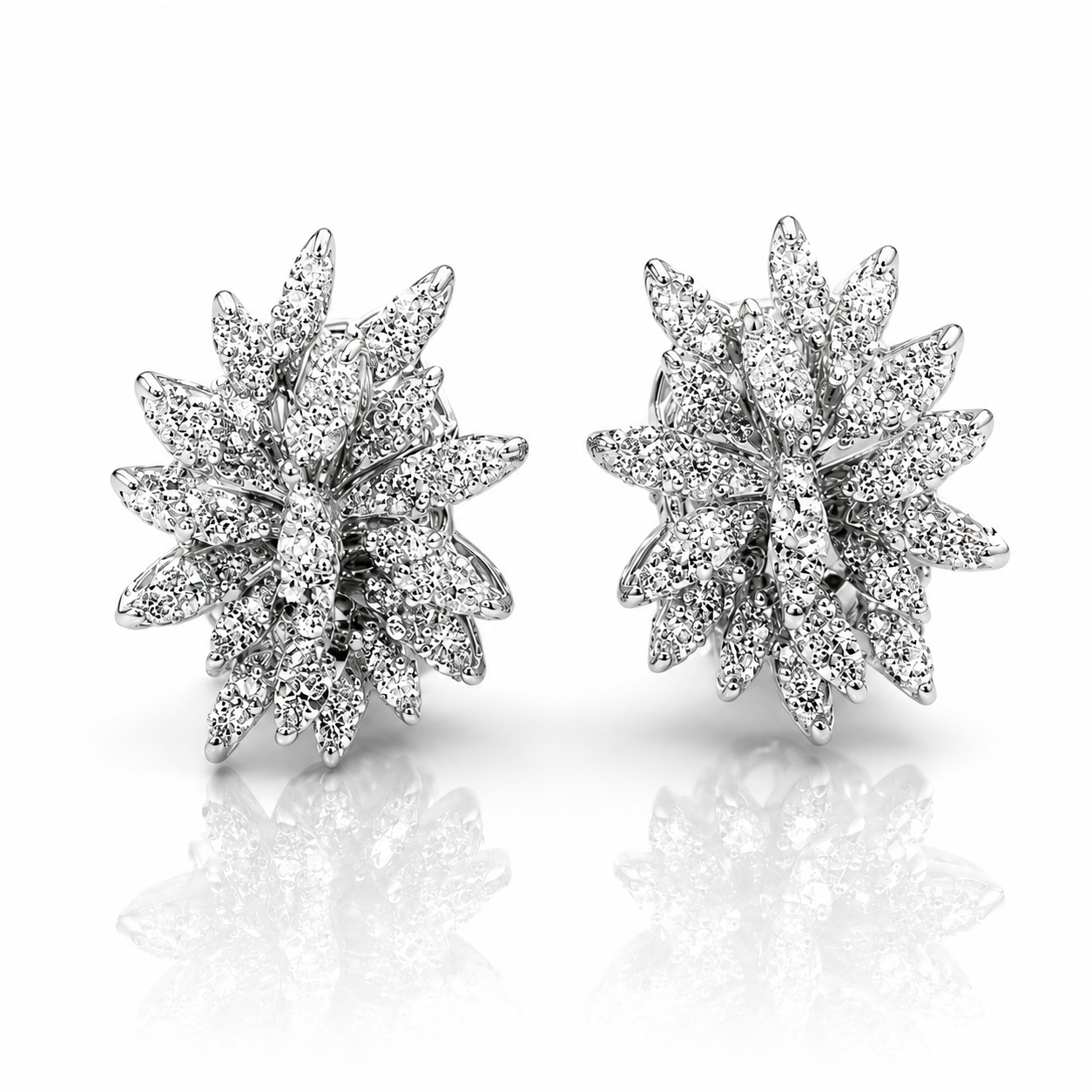 Orecchini petali con diamanti ct 0,60 in oro bianco 18kt (750)