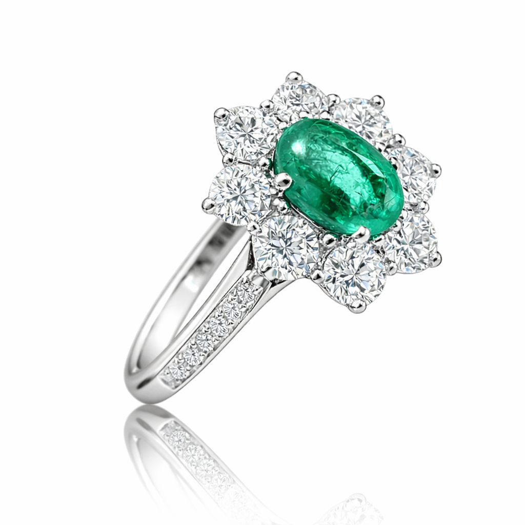 Anello con Smeraldo centrale ct 0,92 e contorno di Diamanti ct 1,10 in oro bianco 18kt (750)