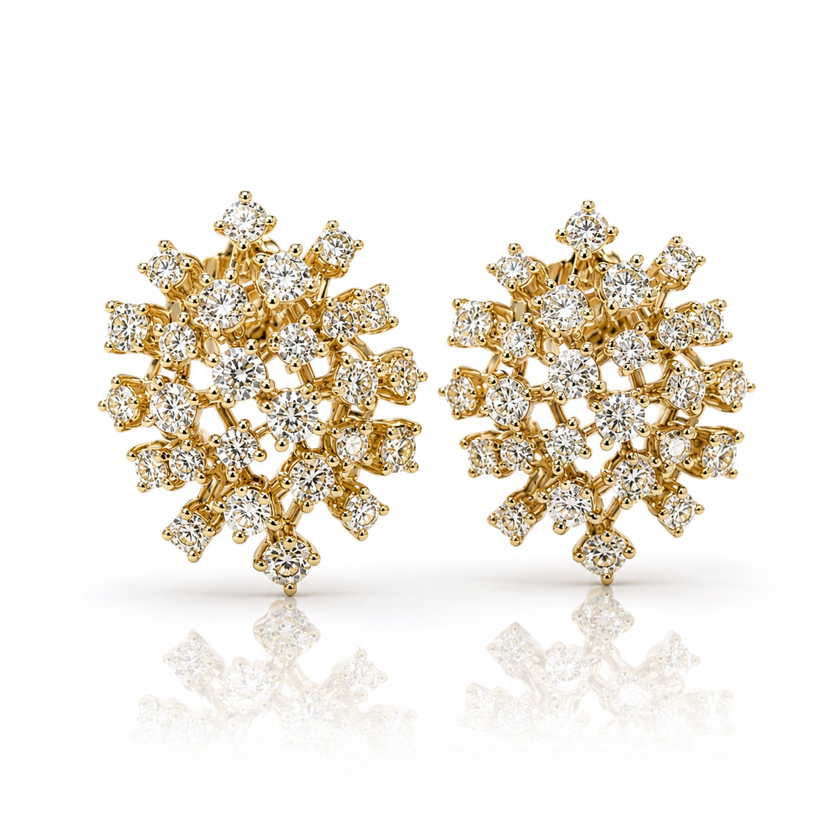 Orecchini bottone movimento floreale con Diamanti ct 1,12 in oro giallo 18kt (750)