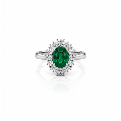 Anello con smeraldo ovale ct 1,60 e diamanti ct 0,60 in oro bianco 18kt (750)