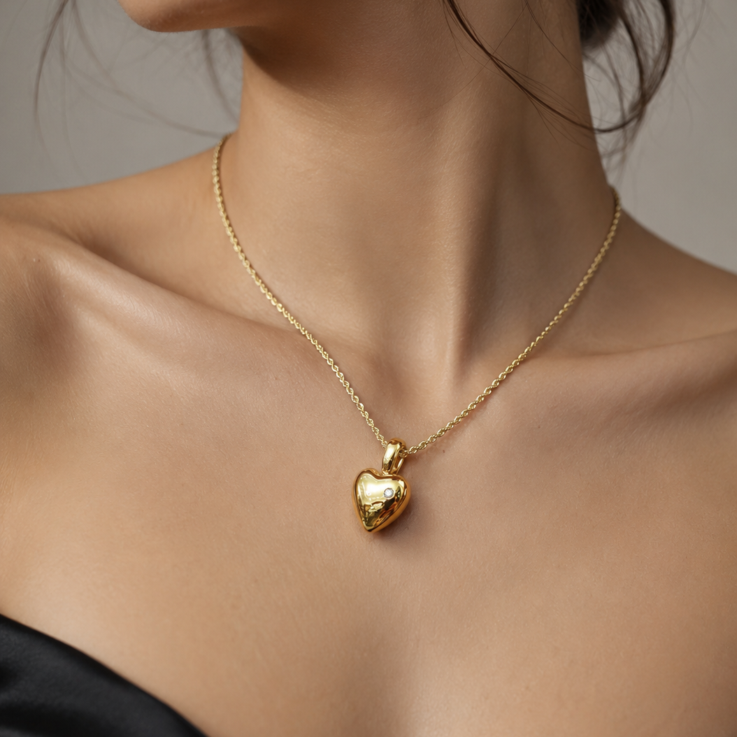 Collana cuore bombato lucido diamante bianco ct 0,06 in oro giallo 18kt (750)
