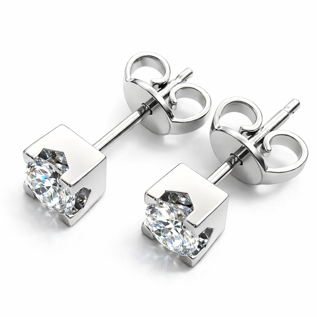 Orecchini punto luce con diamanti 0,70 ct in oro bianco 18kt (750)