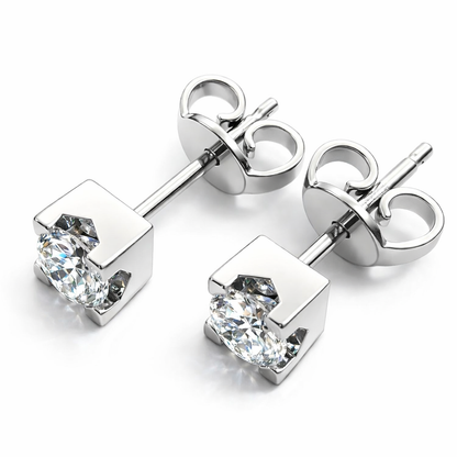 Orecchini punto luce con diamanti 0,70 ct in oro bianco 18kt (750)