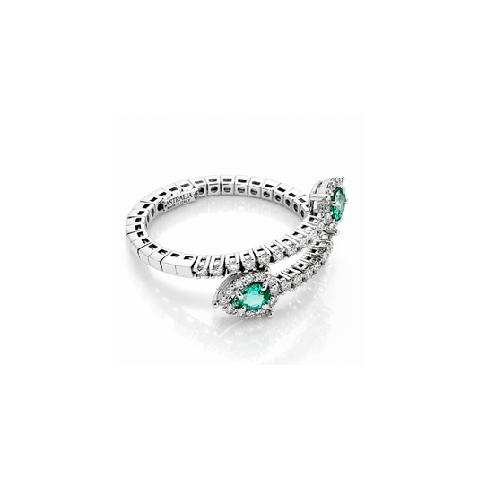 Anello contrarié "Astralia" con diamanti ct 0,50 e smeraldi a goccia ct 0,60 in oro bianco 18kt (750)