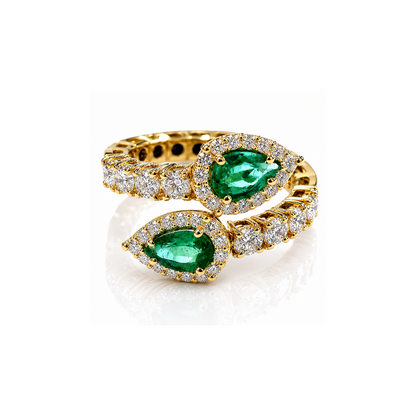 Anello contrarié diamanti 0,86 ct e smeraldo a goccia ct 0,70 in oro giallo 18kt (750)