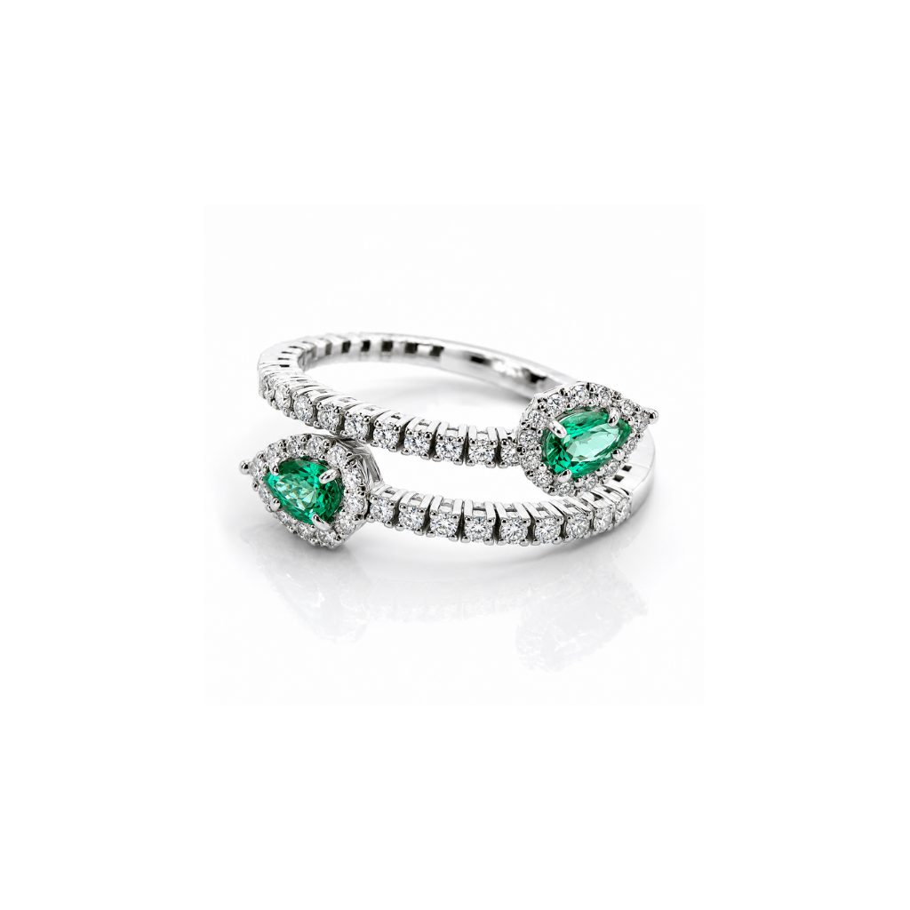 Anello contrarié "Astralia" con diamanti ct 0,50 e smeraldi a goccia ct 0,60 in oro bianco 18kt (750)