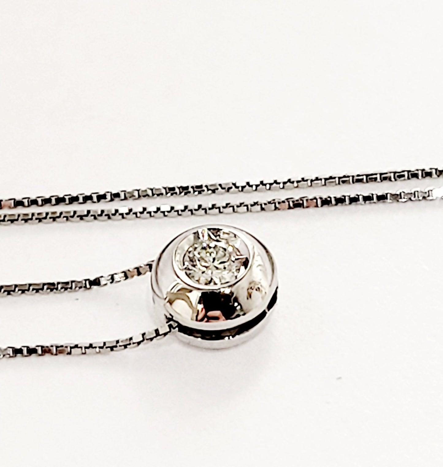 Collana e pendente punto luce a cipollina in Oro Bianco con Diamante 0,25 ct 18 kt (750)