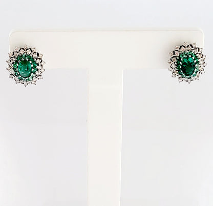 Orecchini ovali in Oro Bianco con doppio giro di Diamanti ct 0,48 e doppio giro di Smeraldi 1,75 ct 18 kt (750)