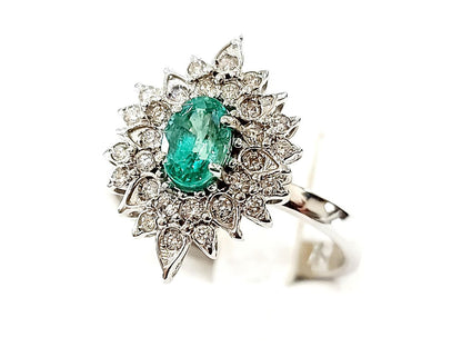 Anello stella Astralia Smeraldo 0,70 ct e contorno di Diamanti 0,30 ct in Oro Bianco 18kt (750)