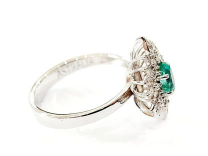 Anello stella Astralia Smeraldo 0,70 ct e contorno di Diamanti 0,30 ct in Oro Bianco 18kt (750)