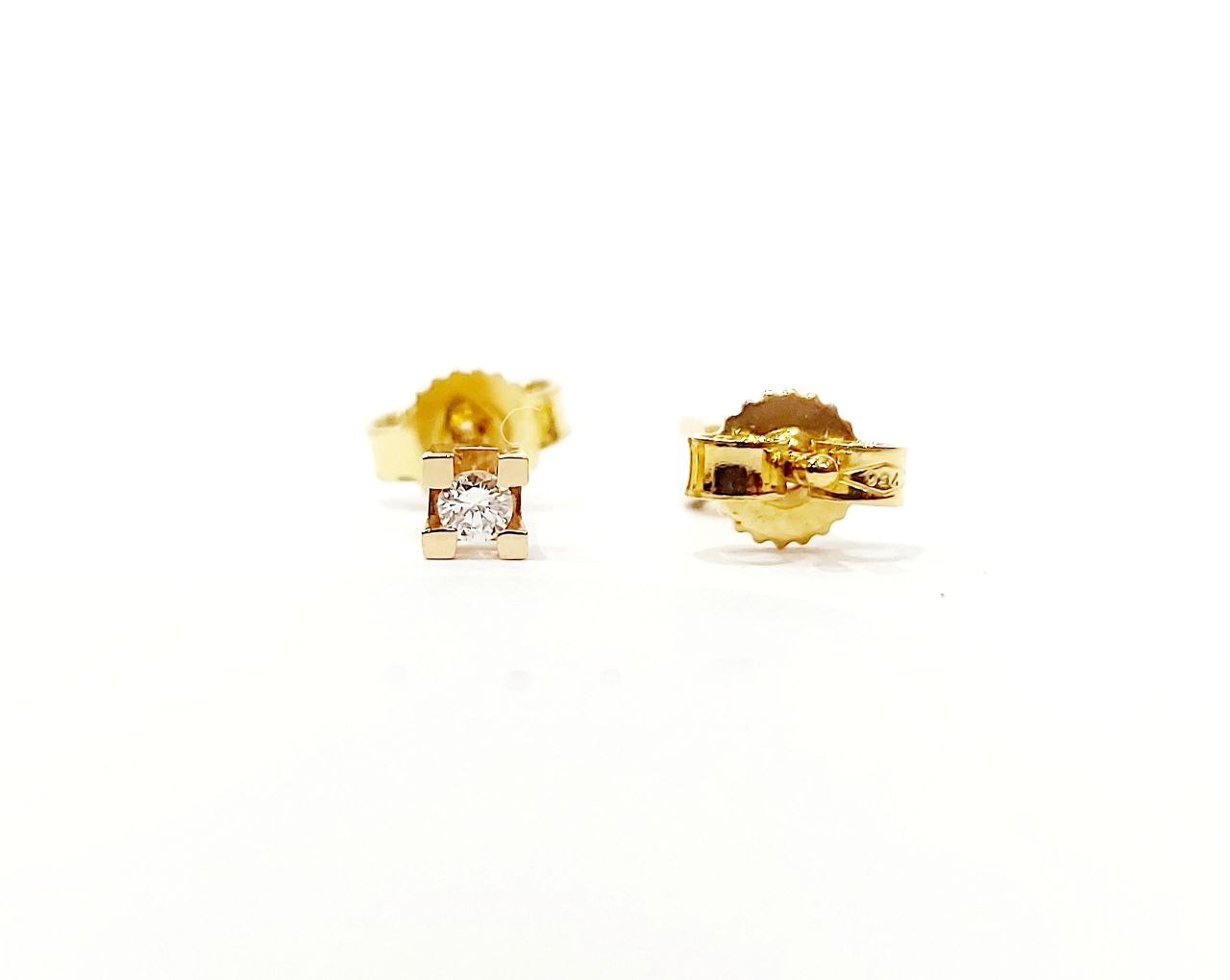Orecchini punto luce tornito con Diamanti 0,06 ct in Oro Giallo 18 kt (750)