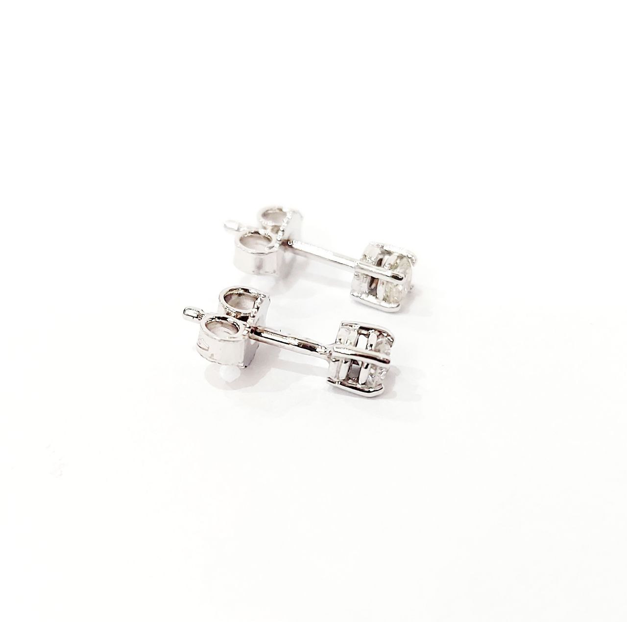 Orecchini punto luce a filo con Diamanti 0,10 ct in Oro Bianco 18 kt (750)
