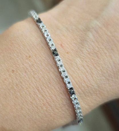 Bracciale tennis in Oro bianco 18kt -750 Diamanti bianchi ct 2,15 Diamanti Neri ct 0,27