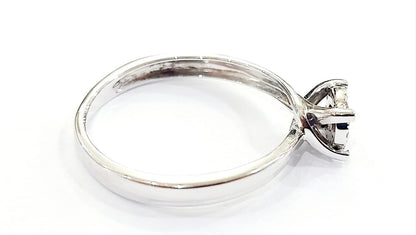 Anello solitario modello magic  con Diamanti ct 0,18 Oro Bianco 18kt-750