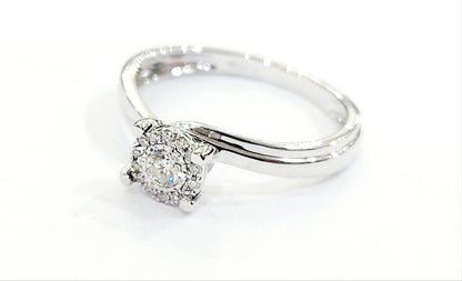 Anello solitario modello magic  con Diamanti ct 0,18 Oro Bianco 18kt-750