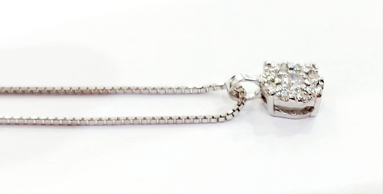 Collana con ciondolo magic in Oro Bianco con Diamanti 0,13  ct 18 Kt (750)