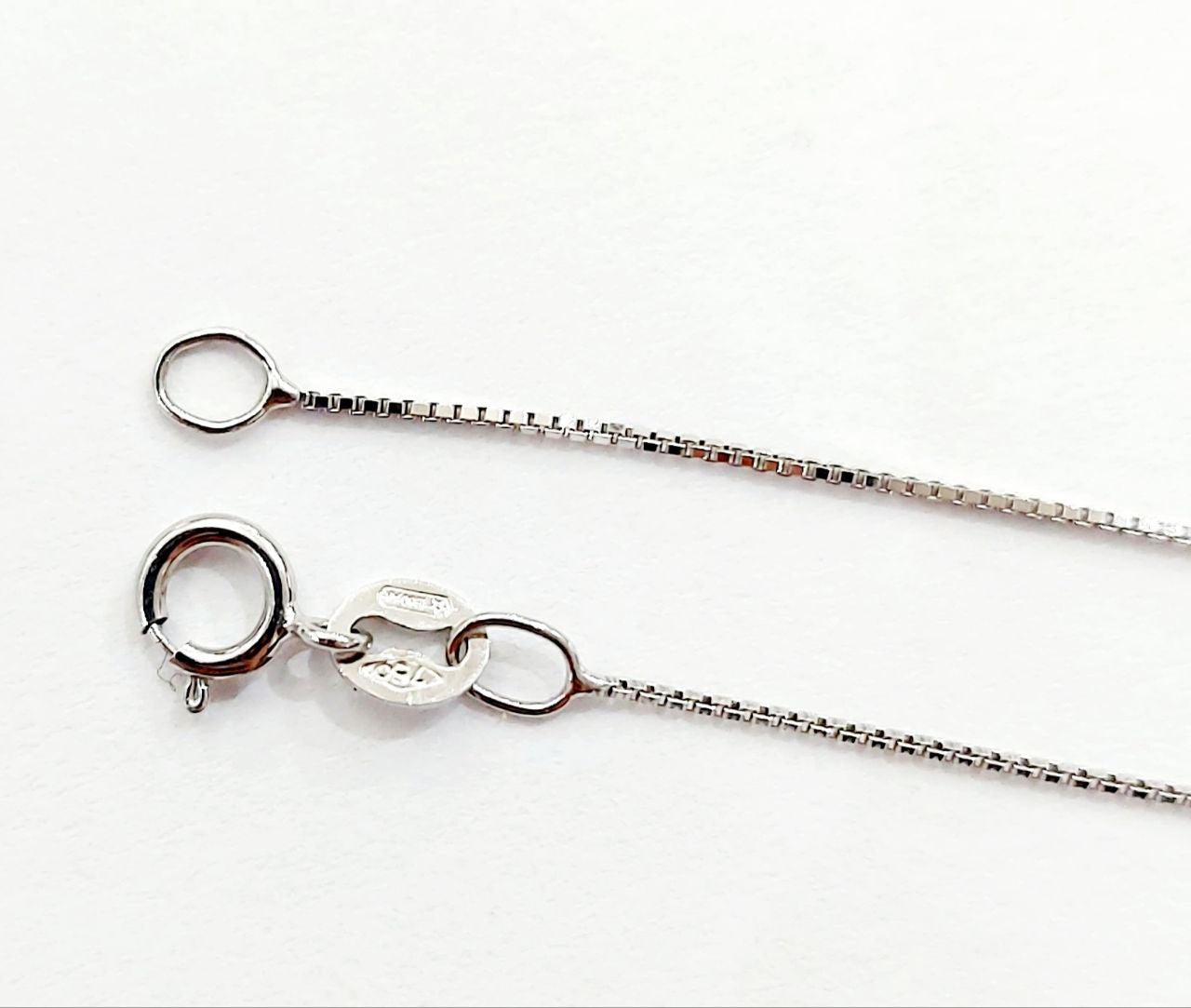 Collana con ciondolo magic in Oro Bianco con Diamanti 0,13  ct 18 Kt (750)