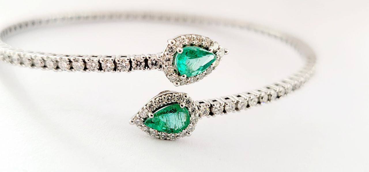 Bracciale Donna a molla contrariè Astralia Smeraldi  ct 0,77 e Diamanti  ct 0,92 Oro Bianco 18kt-750