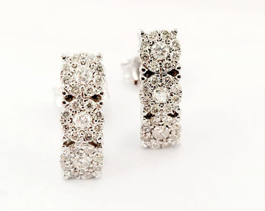 Orecchini modello magic trilogy curvi in Oro bianco 18kt-750 con Diamanti ct 0,55