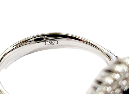 Anello in oro bianco 18K con doppio contorno di diamanti ct 1,12 e zaffiro blu ovale Ct 3,35