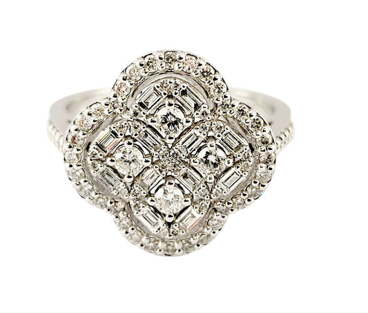 Anello Astralia a fiore in Oro Bianco con Diamanti Baguette ct 0,20 e Brillante ct 0,65 18kt (750)