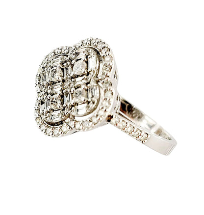 Anello Astralia a fiore in Oro Bianco con Diamanti Baguette ct 0,20 e Brillante ct 0,65 18kt (750)