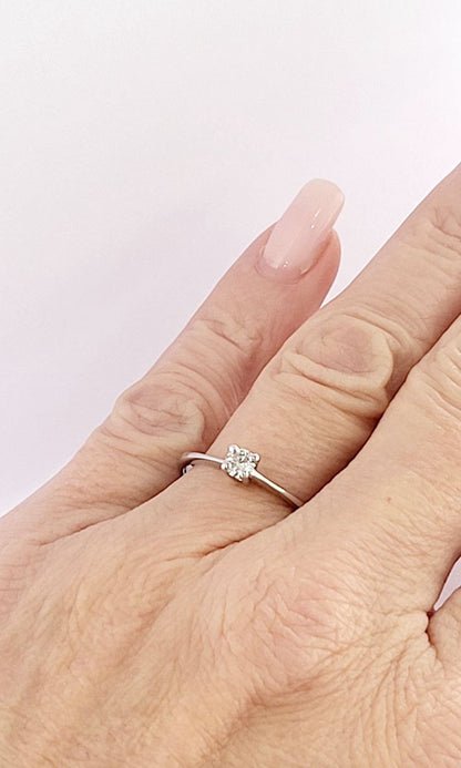 Anello solitario Tiffany 4 griffe Diamante ct 0,10 certificato gemmologico