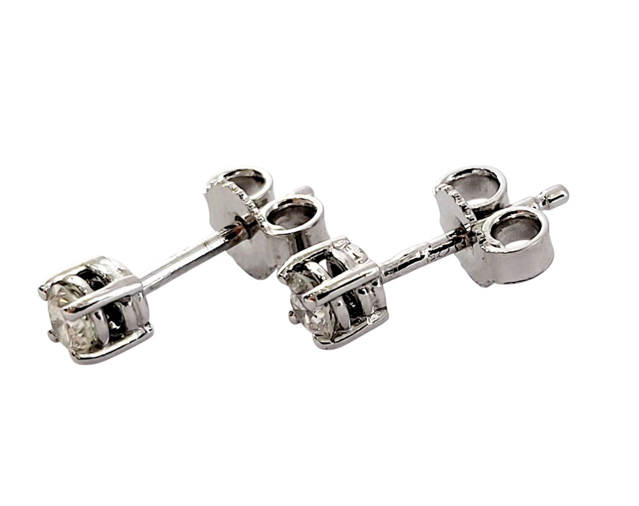 Anello solitario Tiffany 4 griffe + orecchini punto luce a filo con diamanti ct 0,30 + certificato gemmologico