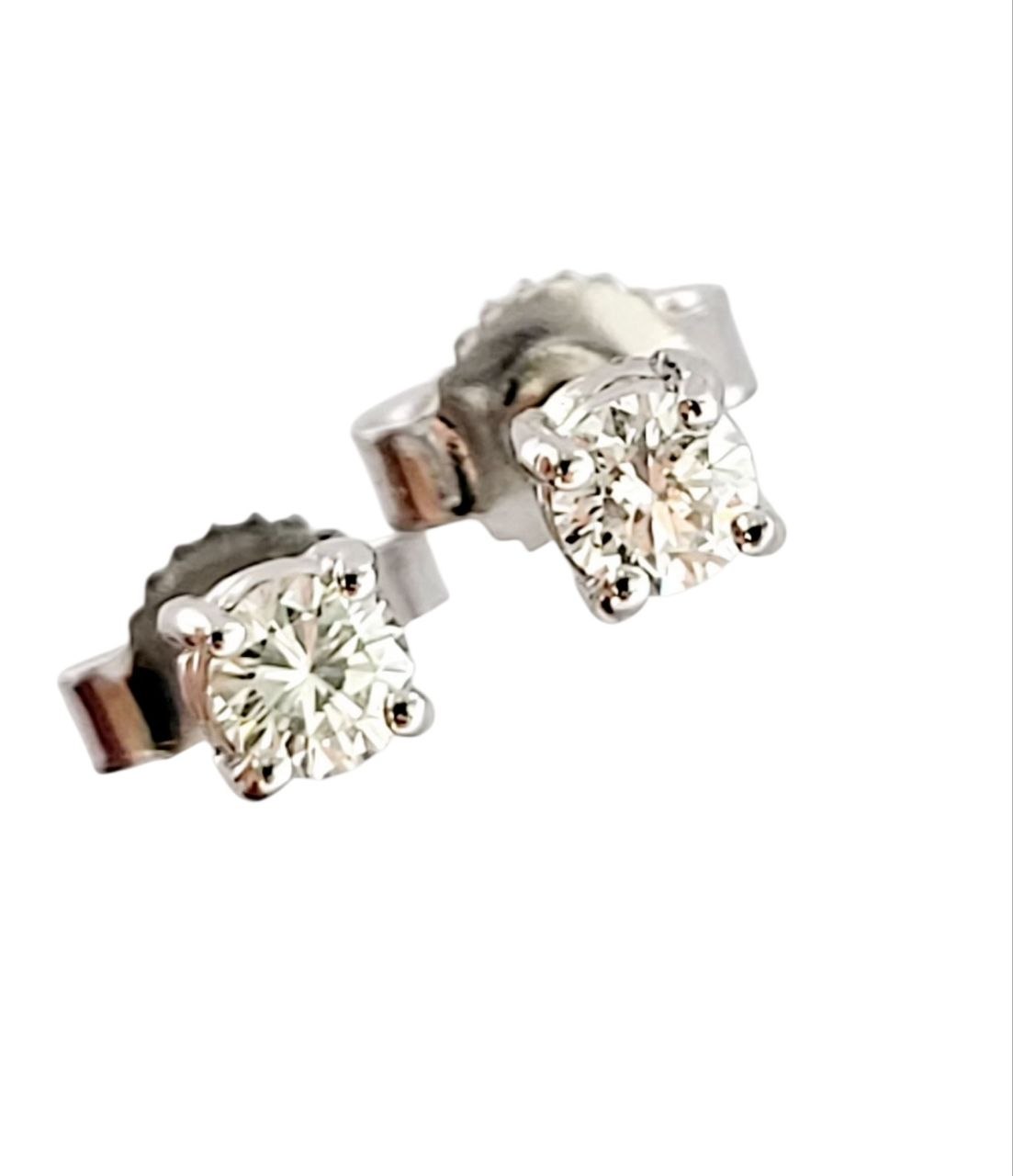 Anello solitario Tiffany 4 griffe + orecchini punto luce a filo con diamanti ct 0,30 + certificato gemmologico