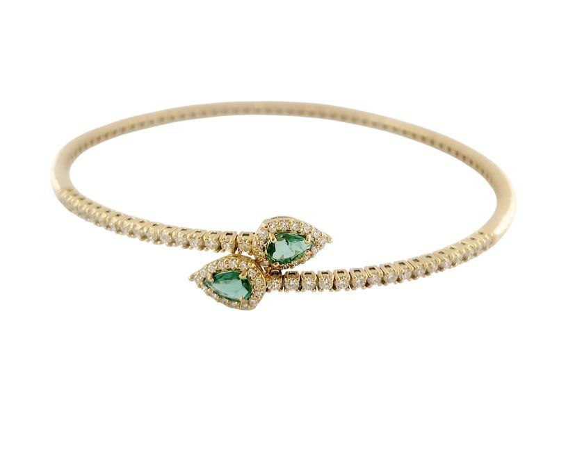 Bracciale a molla contrarié “Astralia” in oro giallo 18Kt con smeraldi 0,77 ct e diamanti 0,92 ct