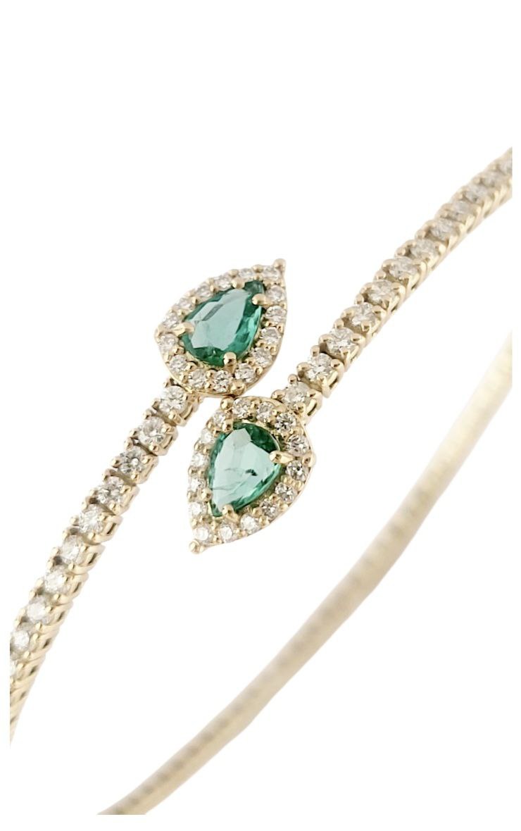Bracciale a molla contrarié “Astralia” in oro giallo 18Kt con smeraldi 0,77 ct e diamanti 0,92 ct
