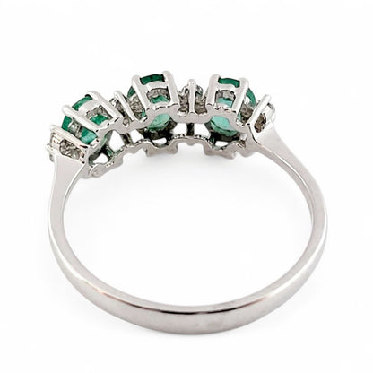 Anello trilogy con Smeraldo ovali ct 0,97 e Diamanti ct 0,12  in oro bianco 18kt (750)