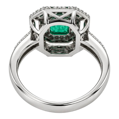 Anello con Smeraldo Ottagonale ct 0,89 e contorno di Diamanti ct 0,45  in oro bianco 18kt (750)